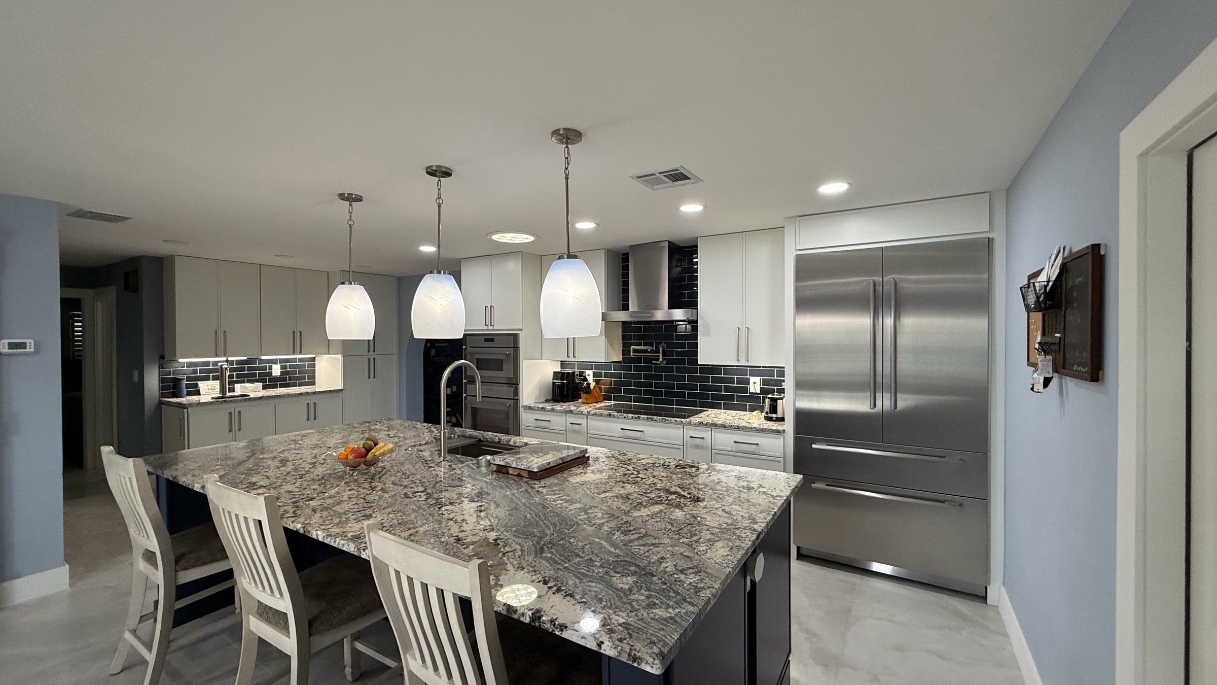 Kitchen island with a speckled granite top