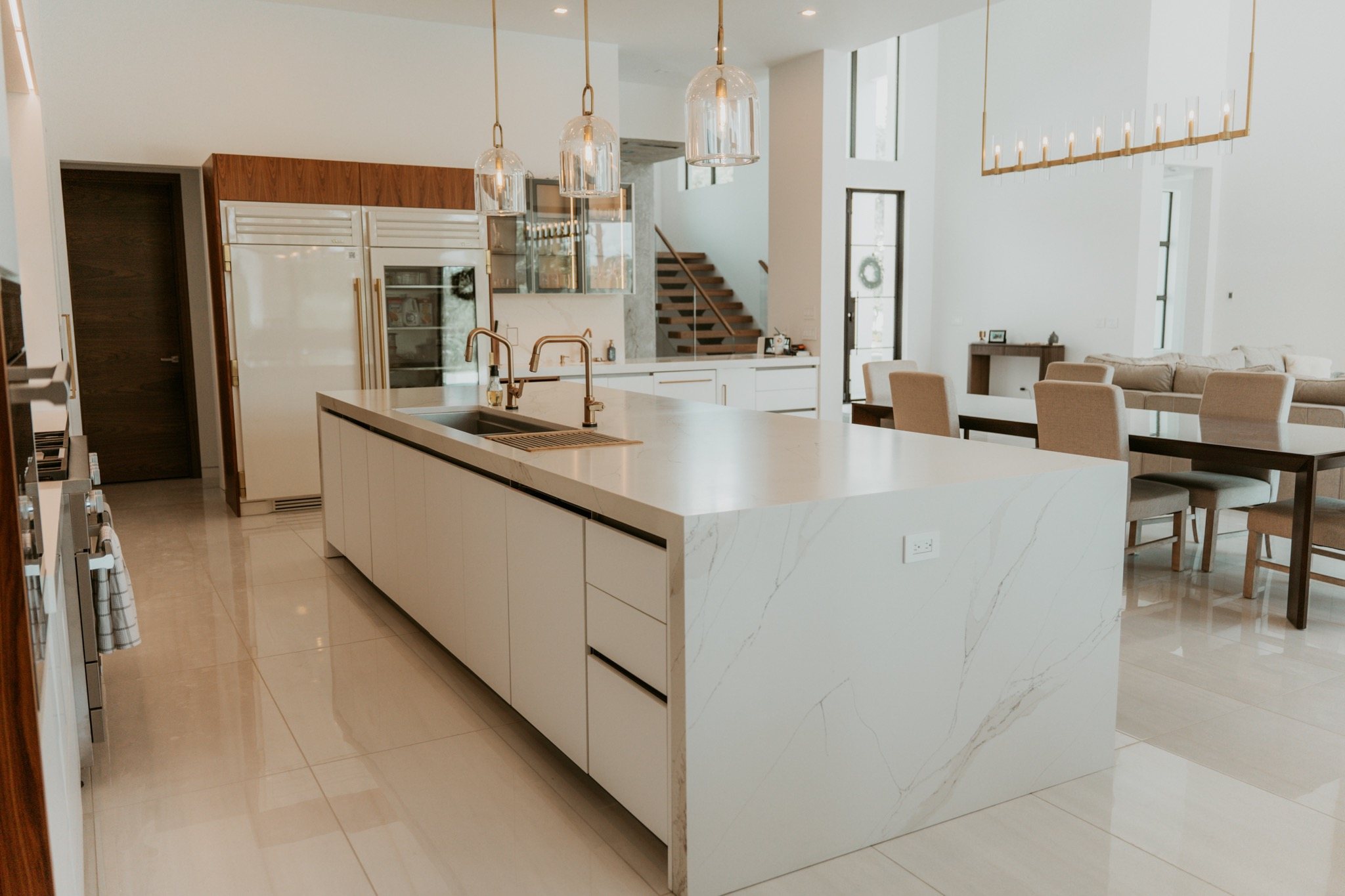 Waterfall island with veining carried down the side panel, installed by HB